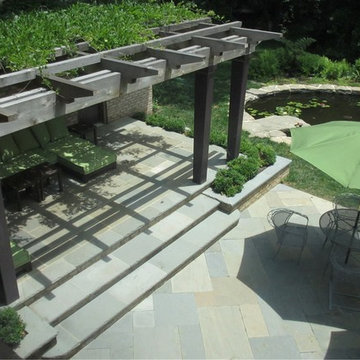 Makeover Patios with Stone Steps, Planters and Pergola