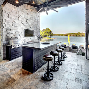 Diseño de patio actual con cocina exterior