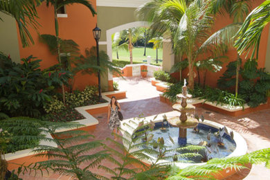 Patio - tropical patio idea in Other