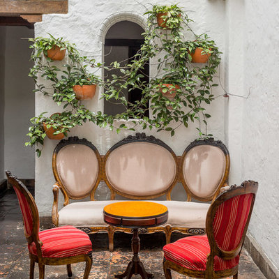 Patio - mediterranean tile patio idea in Chicago