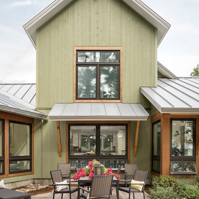 Example of a trendy patio design in Portland Maine with decking and no cover