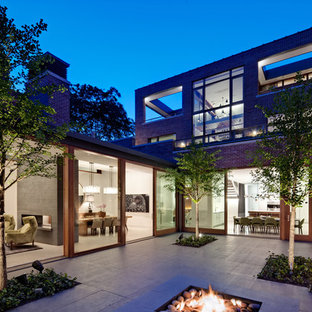 Patio - industrial courtyard patio idea in Chicago