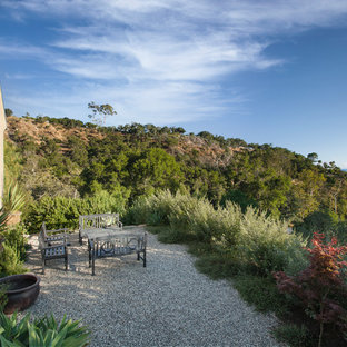 Foto di un patio o portico country con ghiaia e nessuna copertura