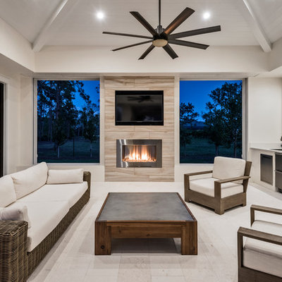 Trendy backyard tile patio kitchen photo in Miami with a roof extension