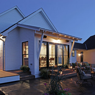 Elegant patio photo in Omaha with a fire pit