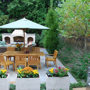 Example of a trendy patio design in Chicago with a fire pit