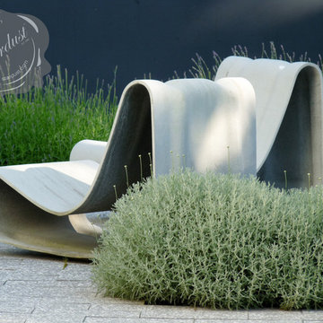 Modern Landscape Design Idea: Interior Courtyard with Willy Guhl Loop Chair