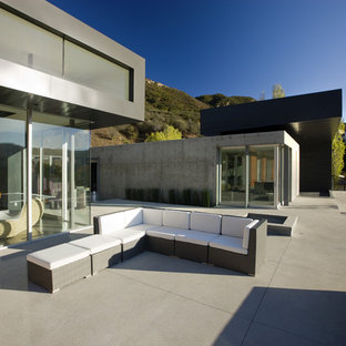 Minimalist concrete patio photo in Los Angeles with no cover