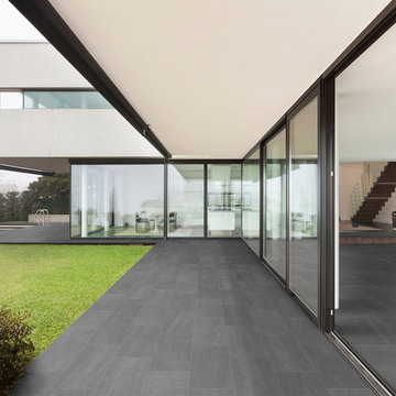 Modern patio with grey porcelain tile
