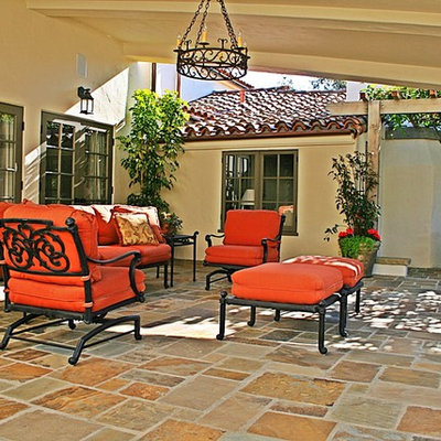 Inspiration for a mediterranean patio remodel in Santa Barbara with a pergola