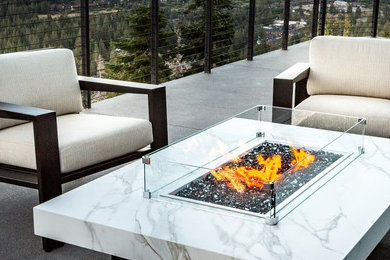 Montecito fire pit table in Dekton Aura with Balboa Lounge Chairs