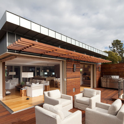 Inspiration for a contemporary patio remodel in Santa Barbara with a pergola