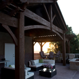 Ispirazione per un patio o portico american style