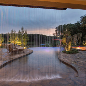 Multi-Level Pool with Rope Swing, Sunken Fire Pit, Waterfalls & Swim Up Bar