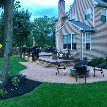 Multi level Trex deck with a patio and fire pit