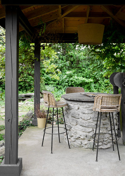 Eclectic Patio by Caroline Sharpnack