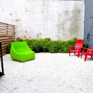 Immagine di un patio o portico boho chic con ghiaia