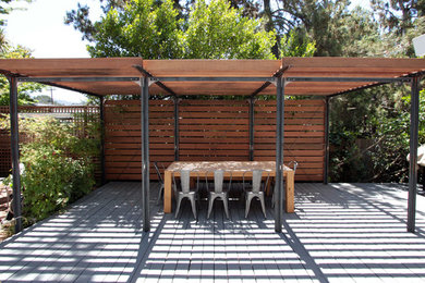 Patio - modern backyard patio idea in San Francisco with a pergola