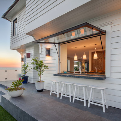 Patio - coastal backyard patio idea in San Diego