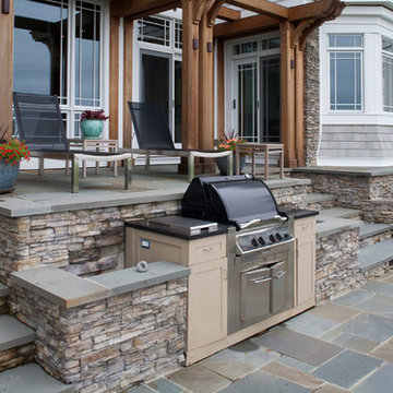 Nautical New England Home with Stacked Stone Patio and Barbecue