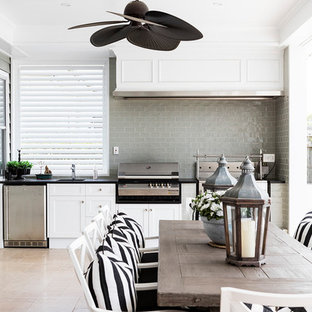 Transitional patio kitchen photo in Brisbane