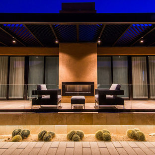 Design ideas for a contemporary courtyard patio in Phoenix with no cover.