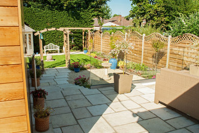 Example of a classic patio design in Gloucestershire