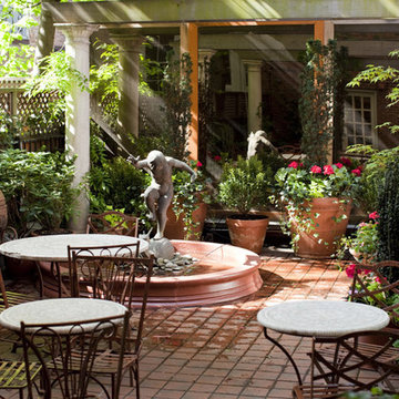 NYC Courtyard Garden Design: Mediterranean Patio, Bistro Tables, Fountain, Shade