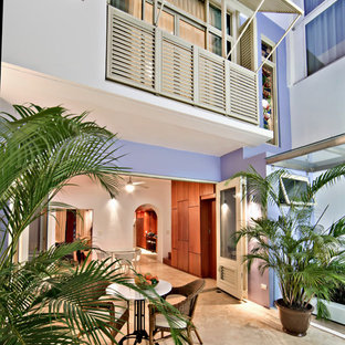 Patio - mediterranean courtyard patio idea in Other