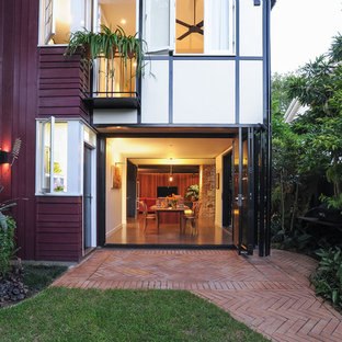 Inspiration for a mid-sized contemporary backyard patio in Brisbane with brick pavers and no cover.