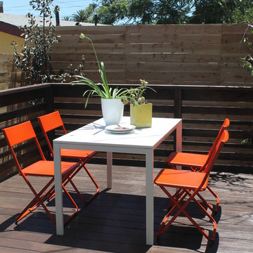 Orange and White Deck Furniture with IKEA Chairs and Table