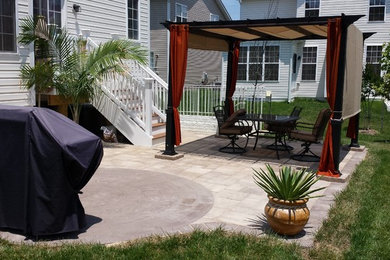 Patio kitchen - mid-sized traditional backyard tile patio kitchen idea in DC Metro with an awning