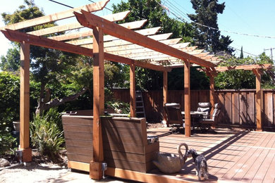 Patio - mid-sized craftsman backyard patio idea in San Francisco with decking and a pergola