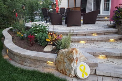 Example of an arts and crafts patio design in Toronto