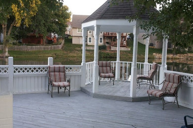 Inspiration for a large timeless backyard patio remodel in Kansas City