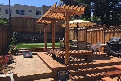 Photo of a medium sized traditional back patio in San Francisco with decking and a pergola.