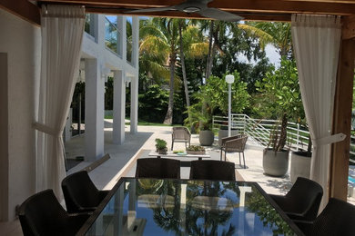Inspiration for a transitional patio remodel in Miami