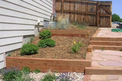 Example of a transitional patio design in Denver