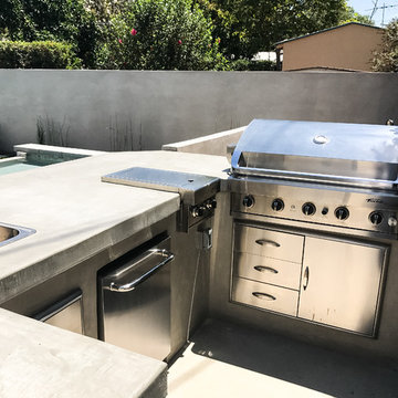 Outdoor Cooking Area, Pool, Artificial Turf and Concrete