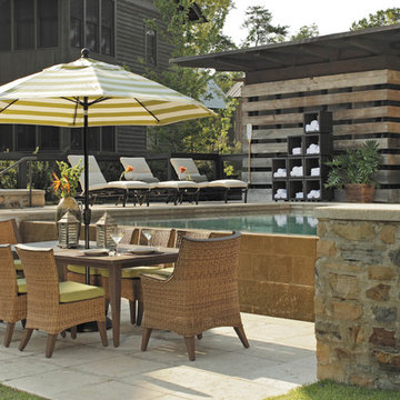 Outdoor dining set with patio umbrella wicker chairs in N-dura resin