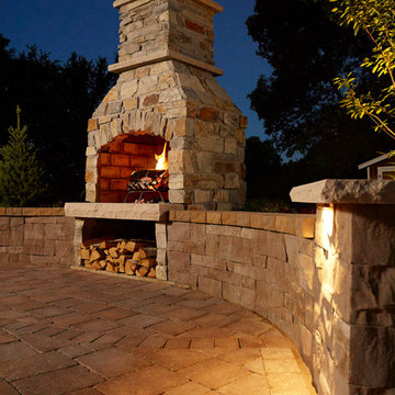 Outdoor Fireplace: Patio with fireplace and curved seat wall