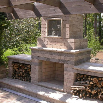 Outdoor fireplace with wood storage