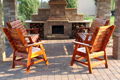 Large mountain style backyard patio photo in Other