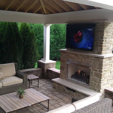 Outdoor Gas Fireplace With Television by Fine's Gas