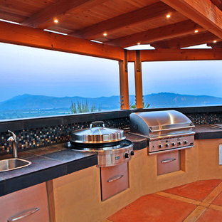 Example of a tuscan patio design in Portland