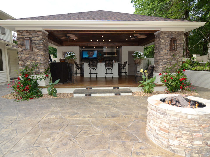 Ideas for a sizable transitional backyard kitchen remodel that includes a gazebo