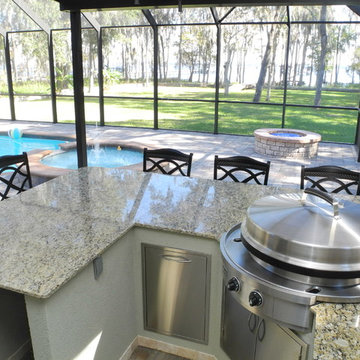 Outdoor Kitchen with Evo Cooktop, Solaire Grill and fire pit.