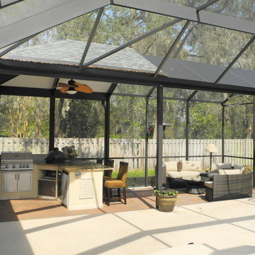 Outdoor kitchen with extended roof.