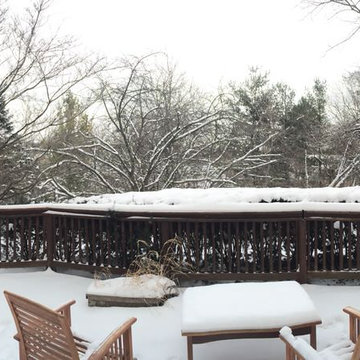 Outdoor Kitchen with fireplace, dining area and seating wall