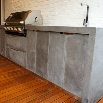 Outdoor Kitchen with Polished Concrete bench top, doors and drawer fronts